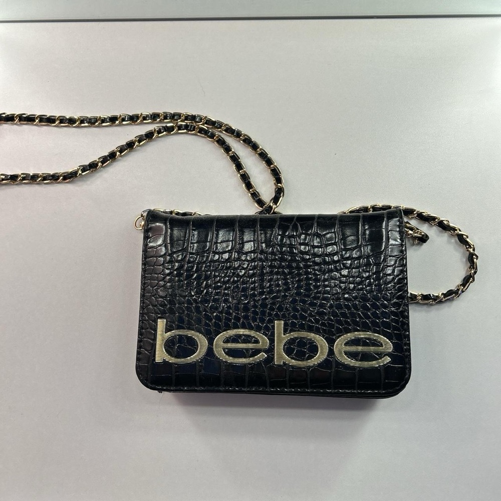 Black and gold snake skin like Bebe purse